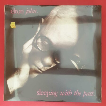 Elton John - Sleeping With The Past